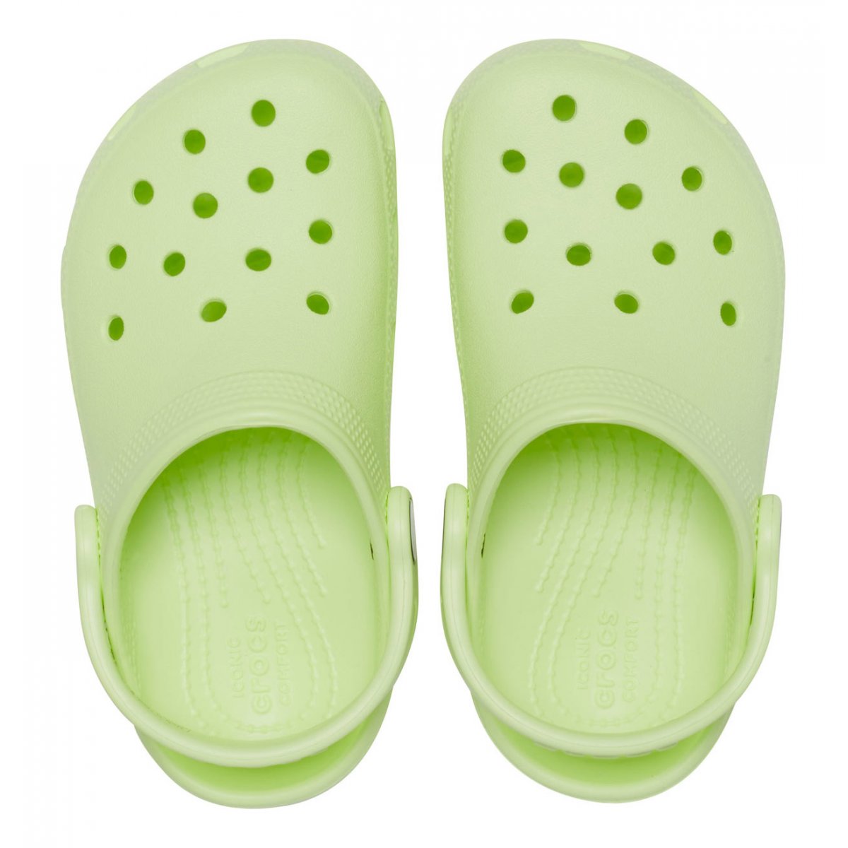 a pair of green shoes with holes on them